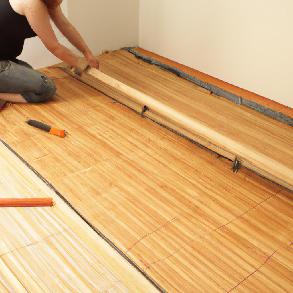 Woman installing bamboo flooring indoors