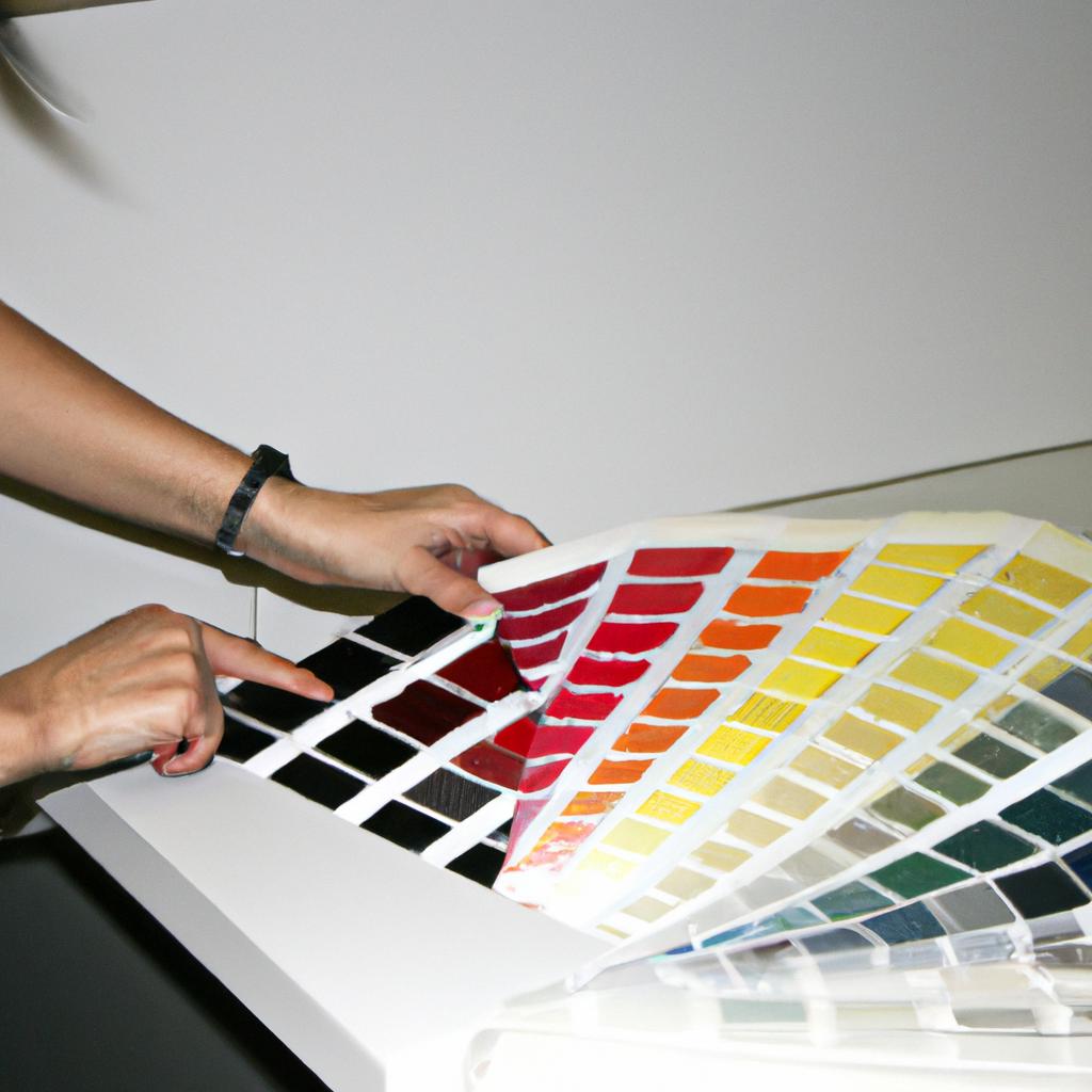 Person selecting paint colors